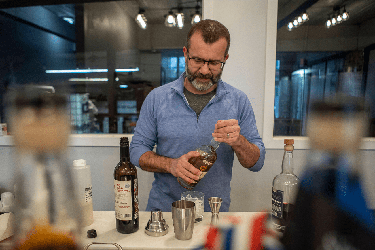 Ryan Hembree prepares a Spring Wish cocktail at Skip Rock Distillers on March 3, 2023 in Snohomish, Washington. (Annie Barker / The Herald)
